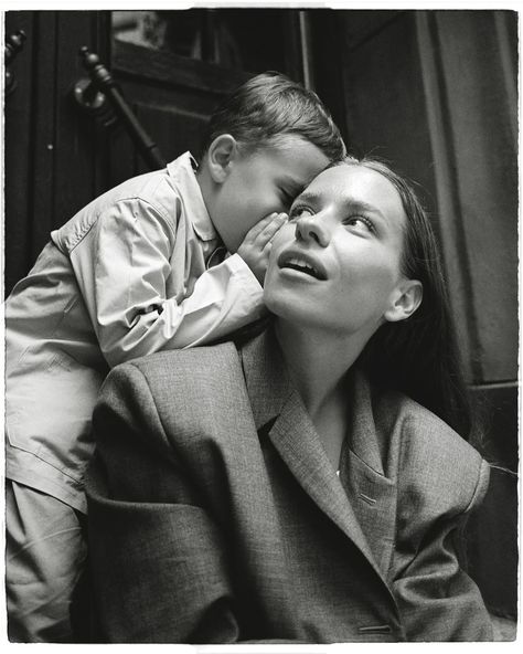 A woman reviewing work in a calm, considered workspace